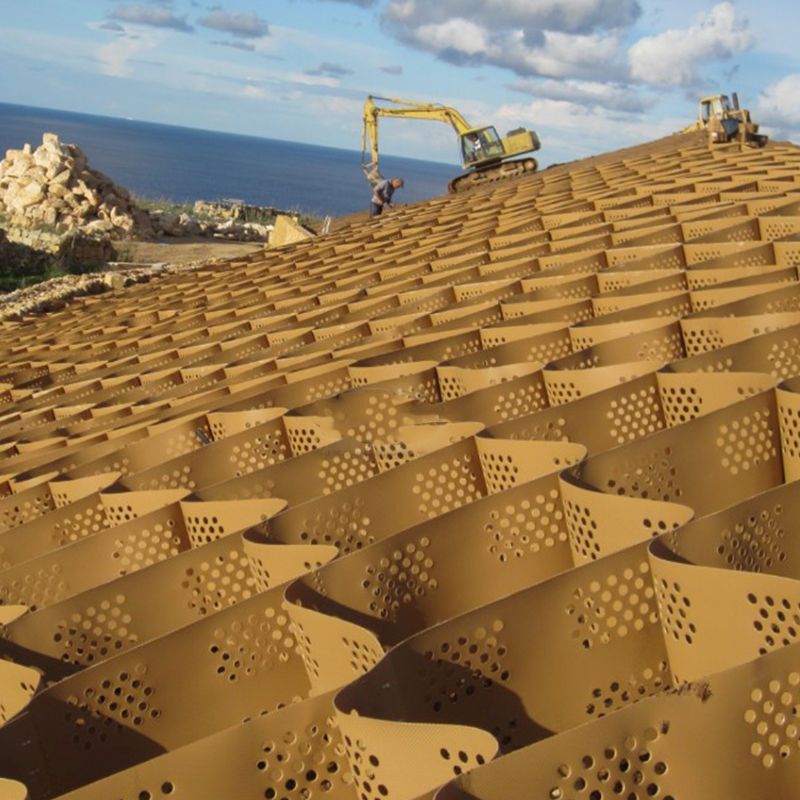 Текстурированная и перфорированная решетка из пластмассовых геоэлементов из HDPE для стабилизации подъезда, усиления дорожного полотна, защиты парковочных площадок и склонов