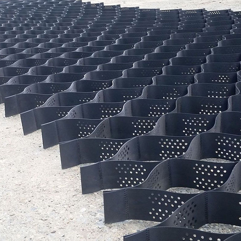 Текстурированная и перфорированная решетка из пластмассовых геоэлементов из HDPE для стабилизации подъезда, усиления дорожного полотна, защиты парковочных площадок и склонов